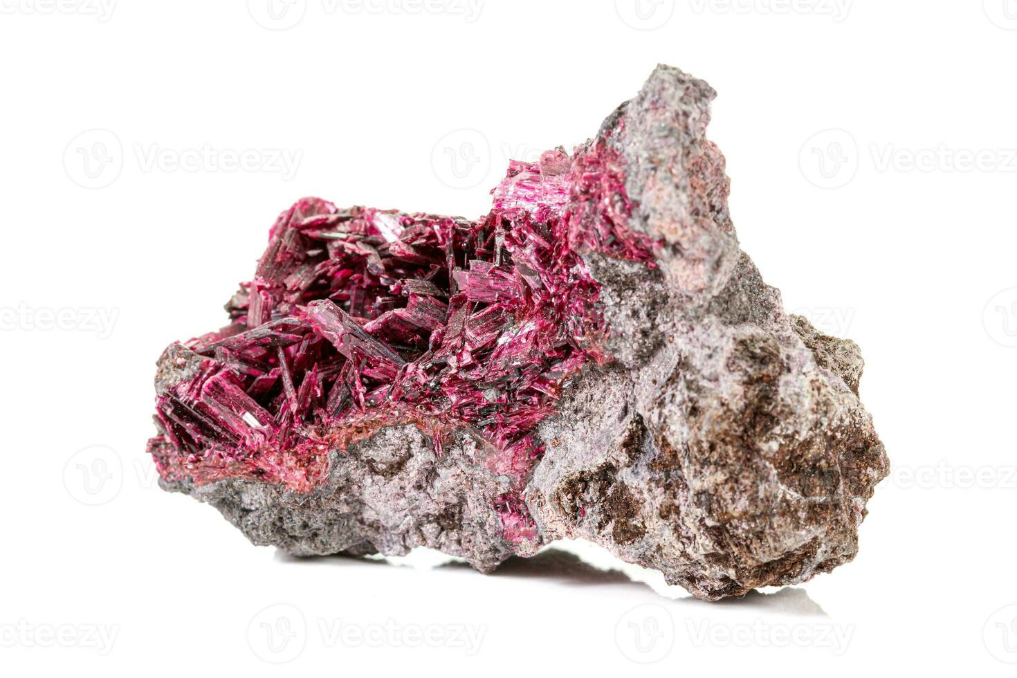 Macro stone mineral Wulfenite on a white background photo