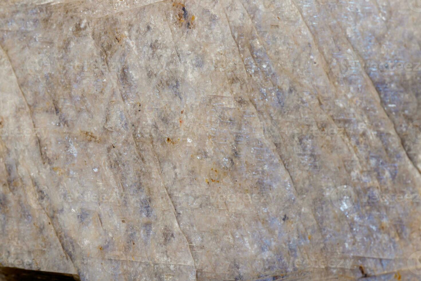 Macro of a stone Moonstone mineral on a black background photo