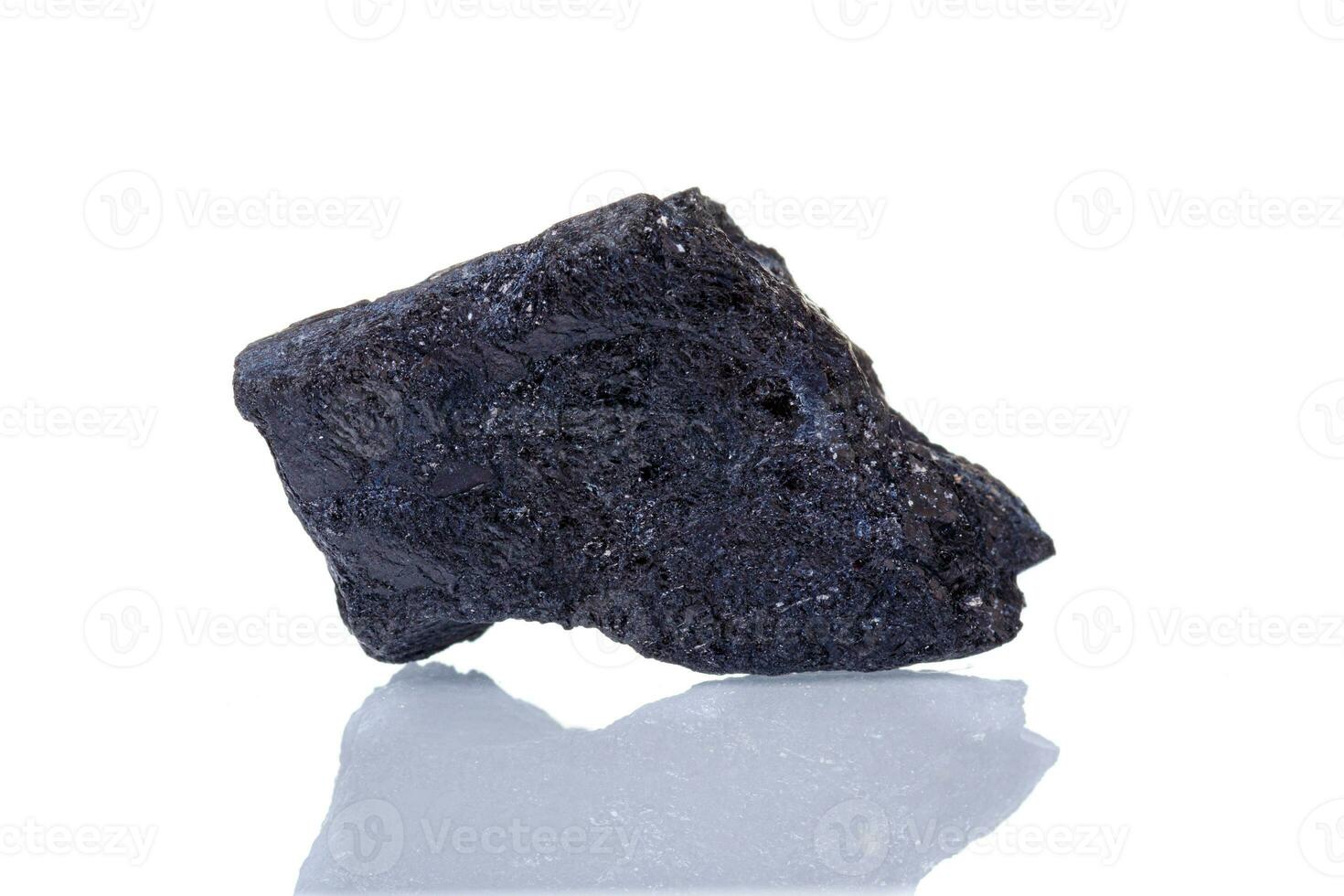 macro mineral stone Schorl on a white background photo