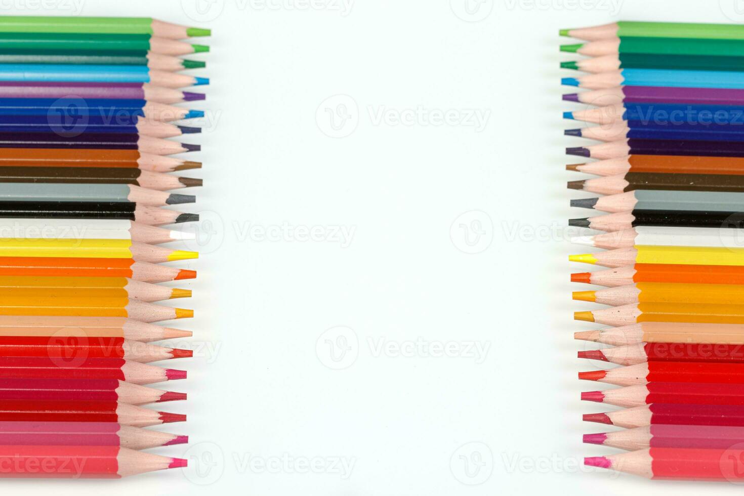 Multi-colored pencils in a row photo