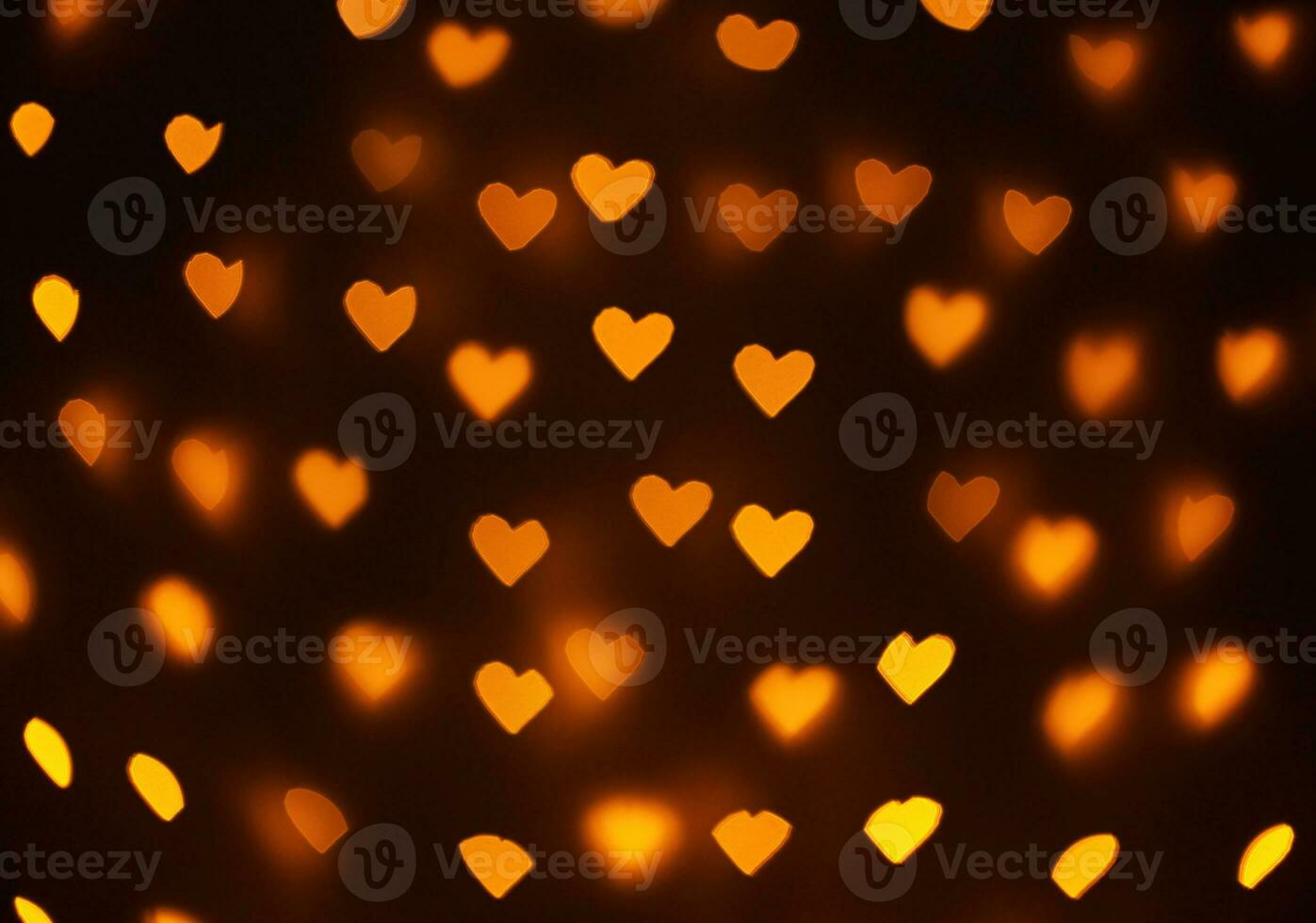 beautiful hearts made of lights on a blurred background photo