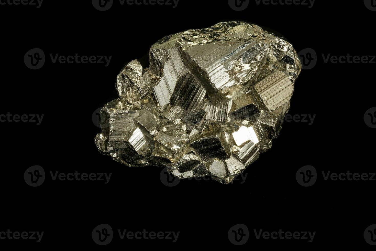 Macro mineral stone Pyrite on a black background photo