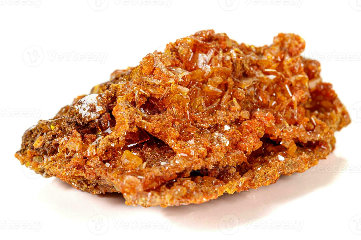 Macro stone mineral Wulfenite on a white background photo