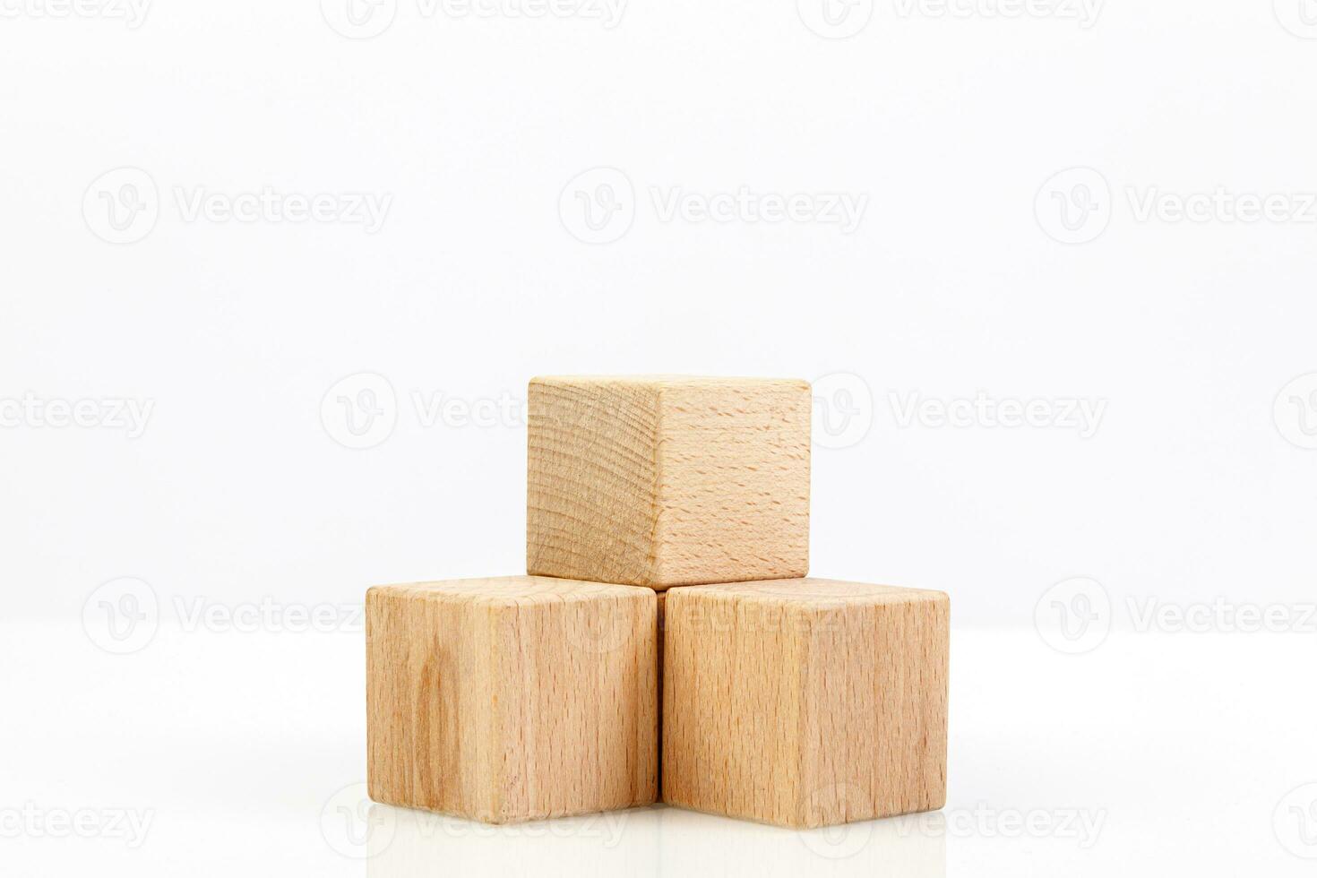 Wooden cubes on a white background photo