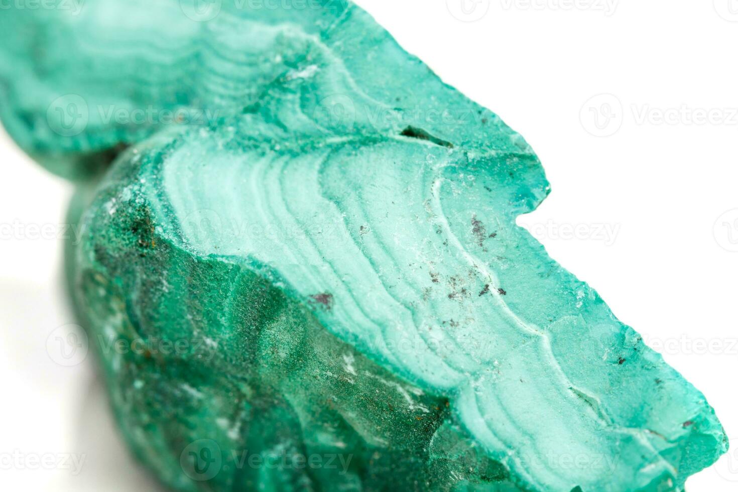 Macro mineral stone Malachite in the rock on a white background photo