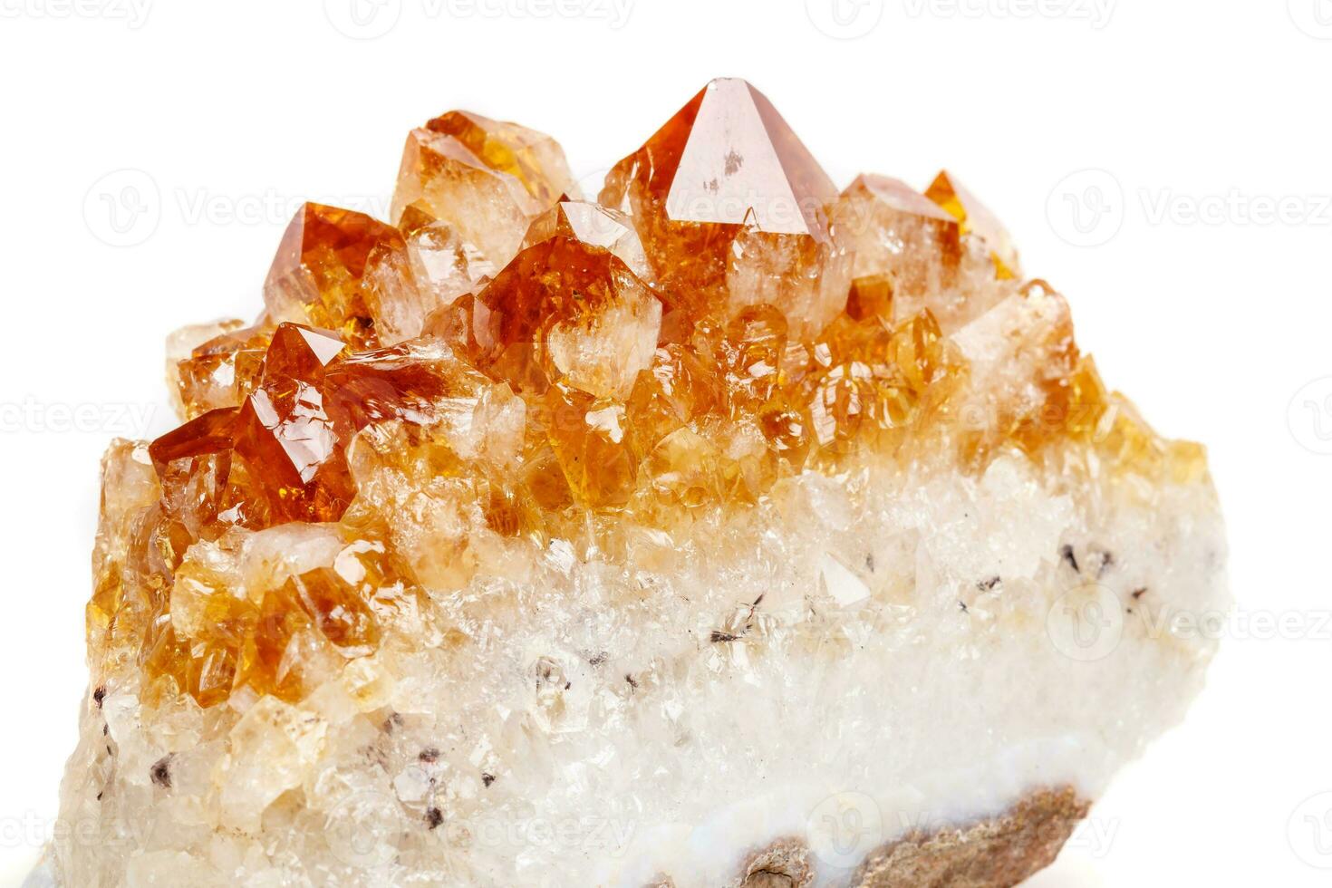 Macro mineral stone Citrine in rock in crystals on a white background photo