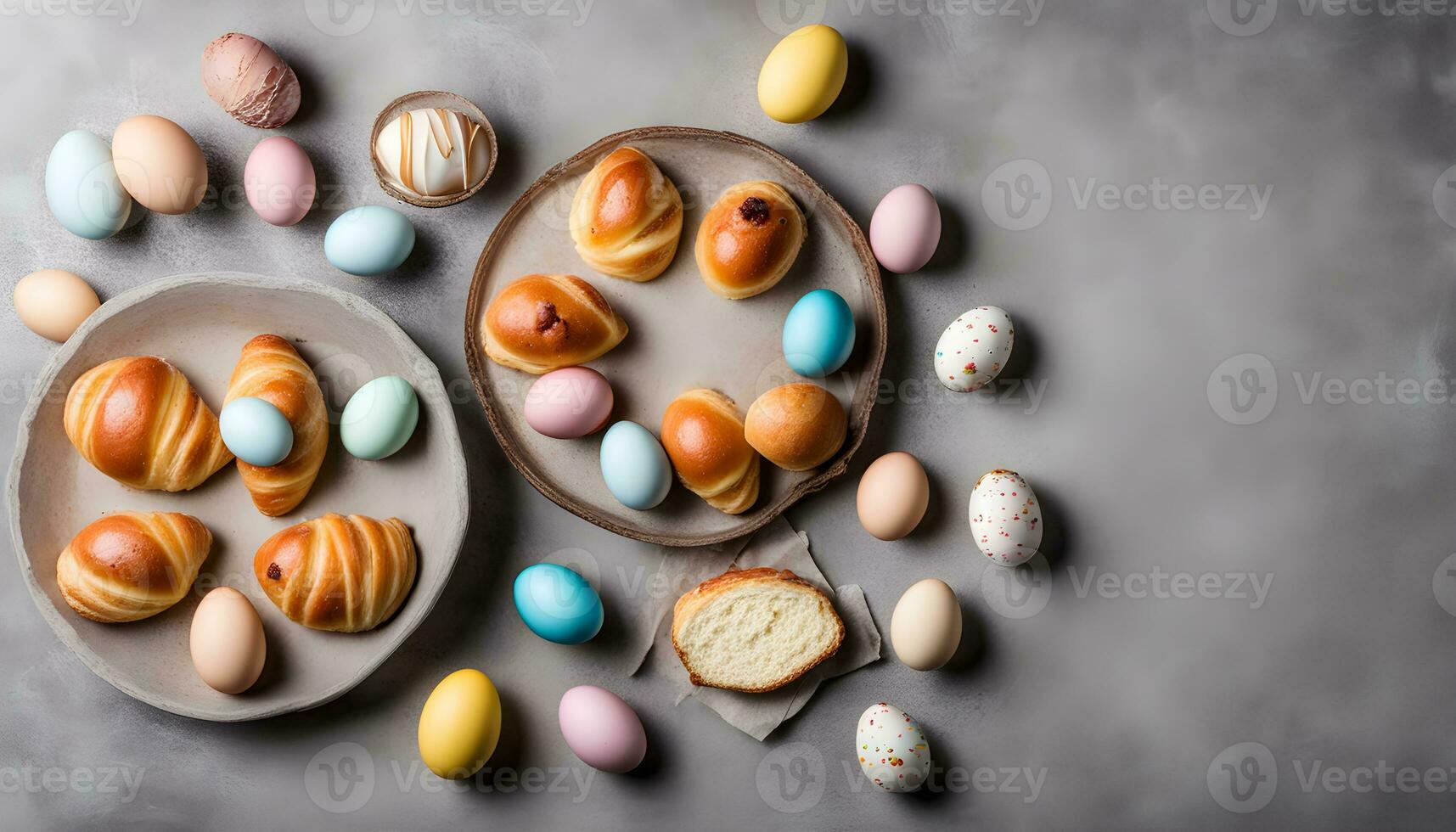 AI generated easter eggs and croissants on a gray background photo