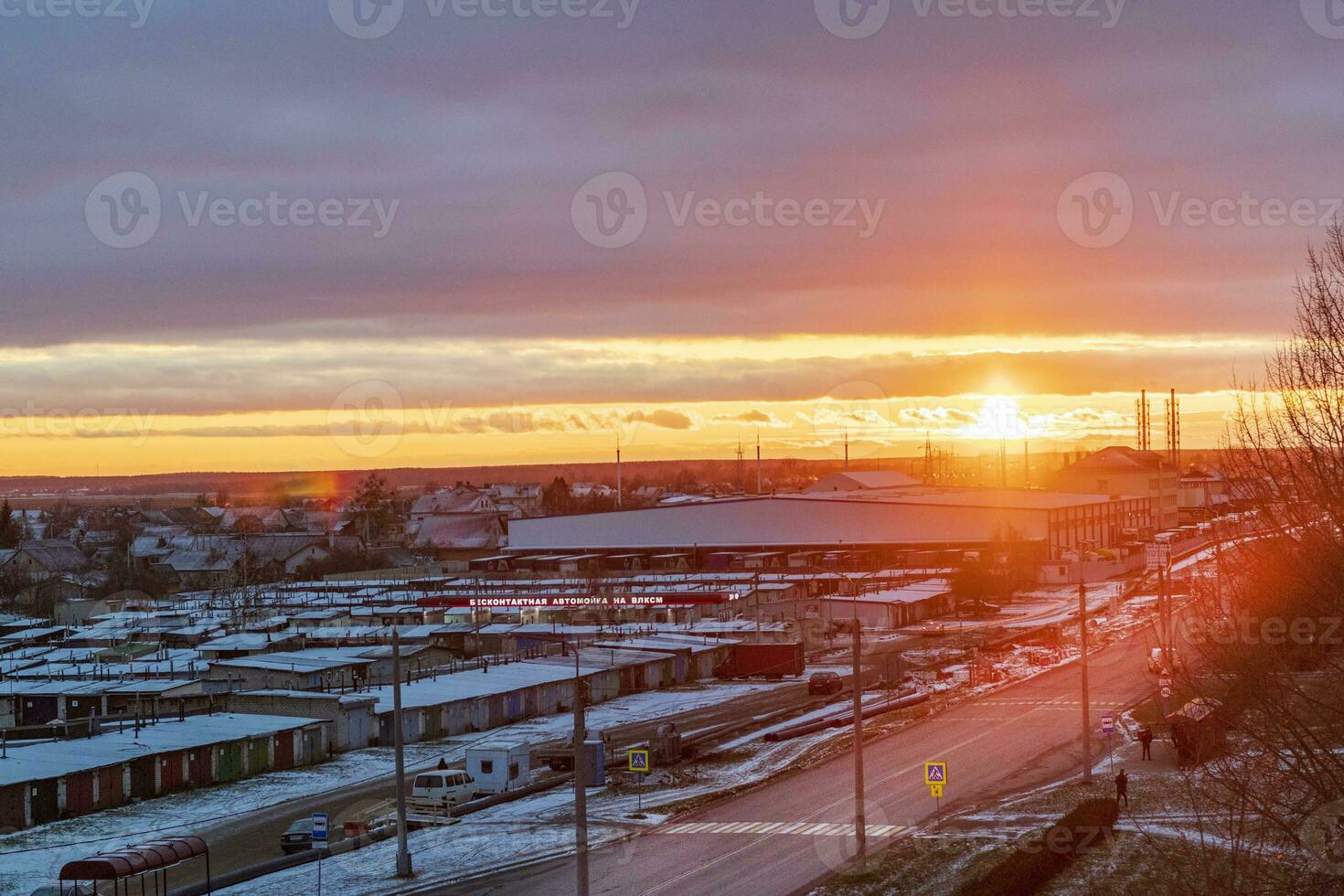 Brest, Belarus -11.25.2023 - Shot of the dramatic sunset in the rural city in the cold evening. Nature photo