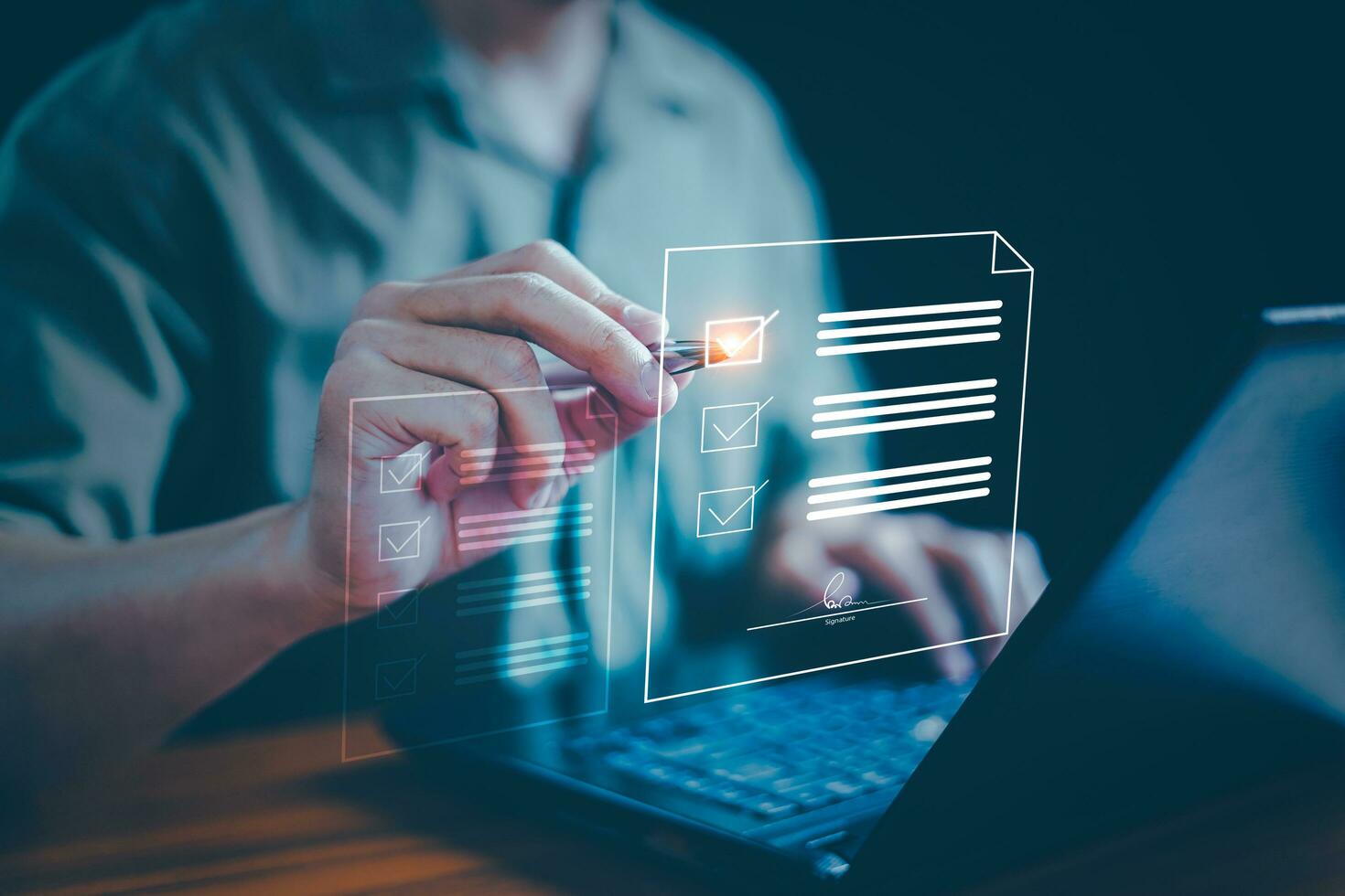 Document management or electronic signature concept, Businessman use laptop and check signature on electronic document at office, Digital network, Technology paperless sign online on application. photo