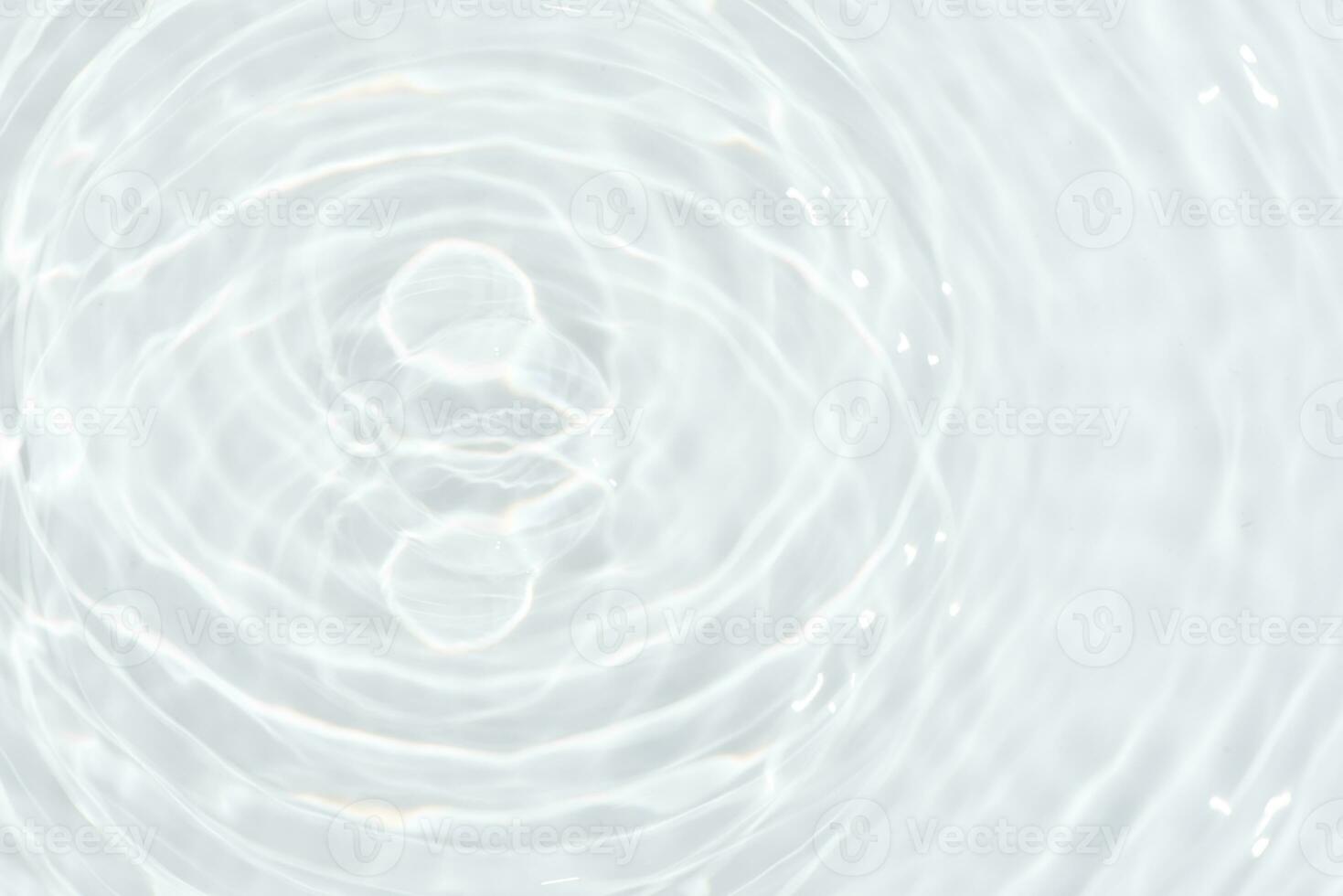 White water with ripples on the surface. Defocus blurred transparent white colored clear calm water surface texture with splashes and bubbles. Water. photo