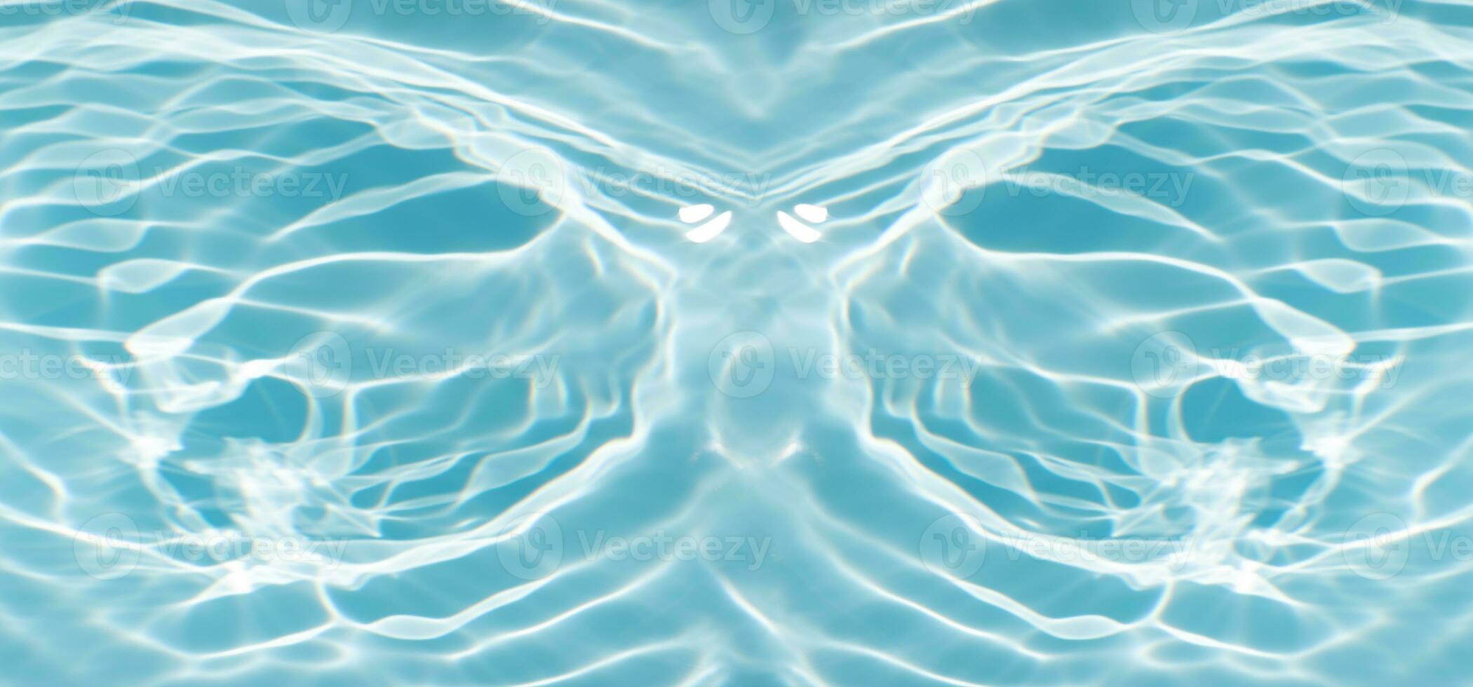 Bluewater waves on the surface ripples blurred. Defocus blurred transparent blue colored clear calm water surface texture with splash and bubbles. Water waves with shining pattern texture background. photo