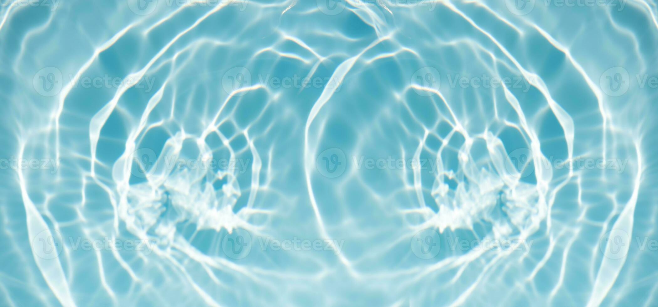 Defocus blurred transparent blue colored clear calm water surface texture with splashes and bubbles. Trendy abstract nature background. Water waves in sunlight with copy space. Blue watercolor shining photo