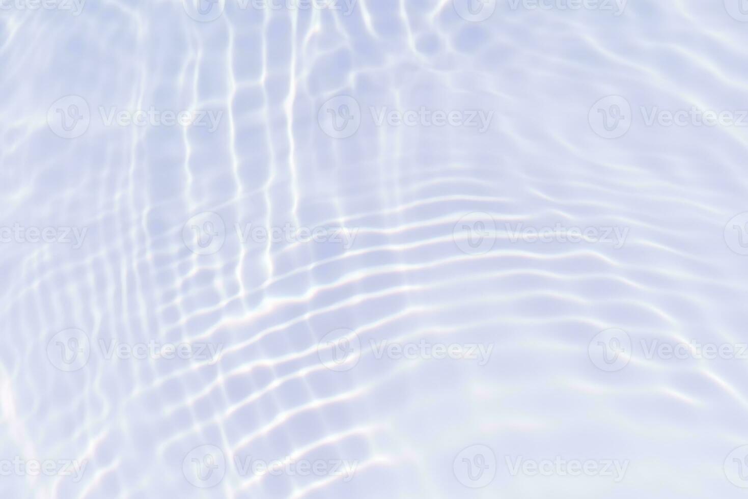 Defocus blurred transparent blue colored clear calm water surface texture with splashes and bubbles. Trendy abstract nature background. Water waves in sunlight with copy space. Blue watercolor shining photo