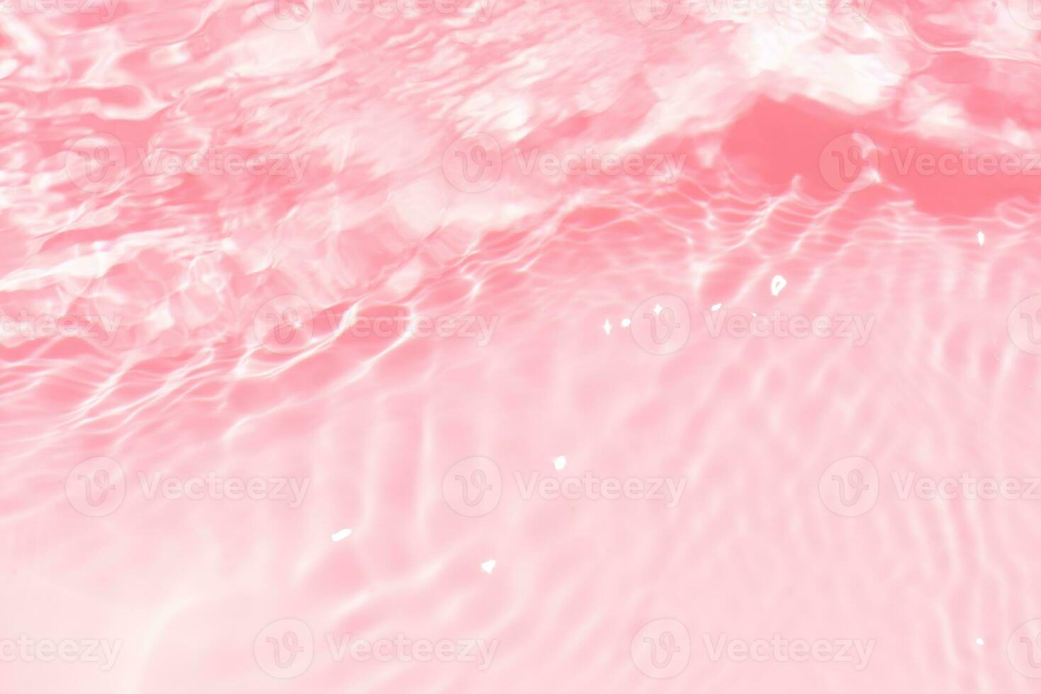 Defocus blurred transparent blue colored clear calm water surface texture with splashes and bubbles. Trendy abstract nature background. Water waves in sunlight with copy space. Blue watercolor shining photo