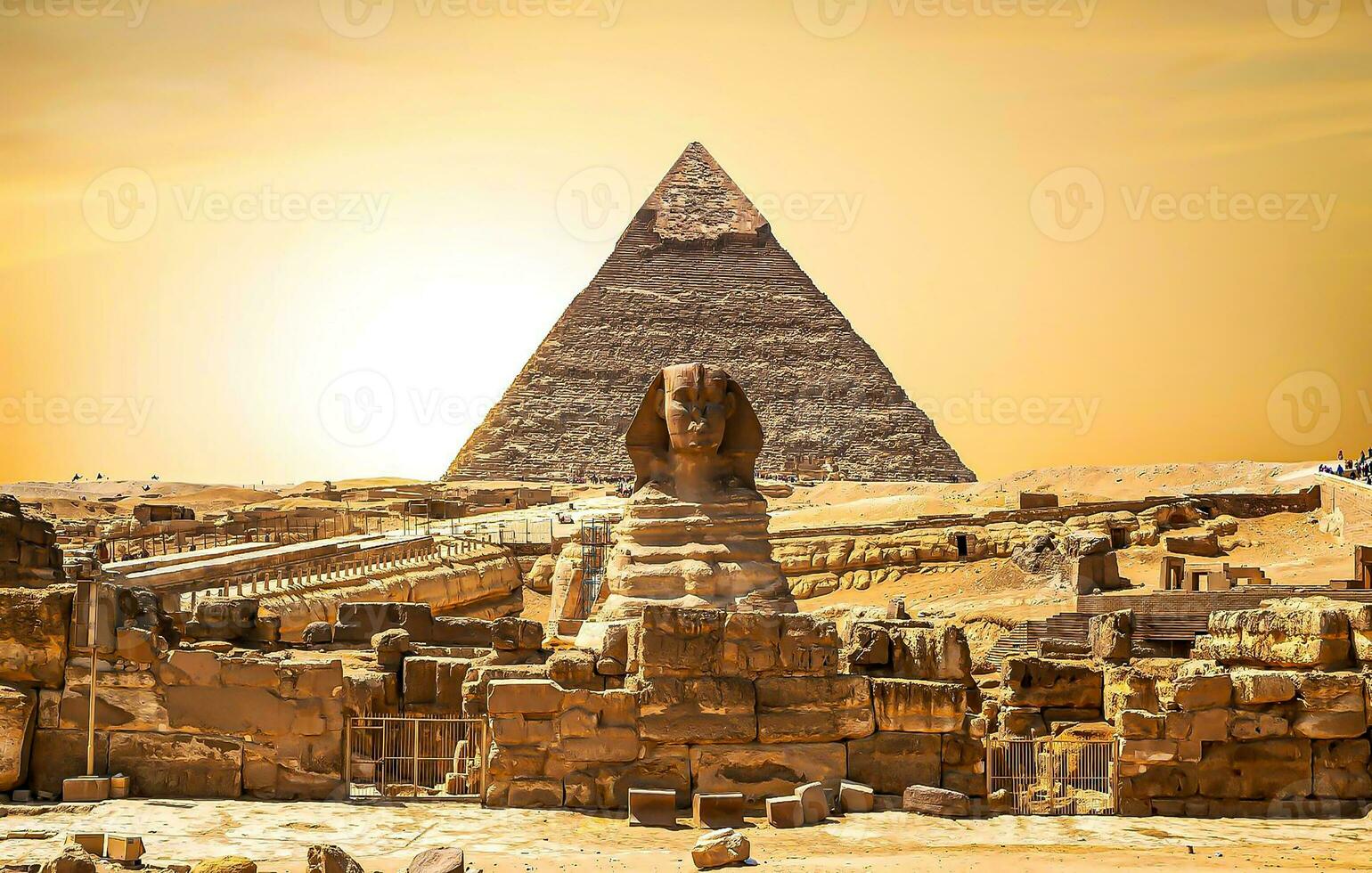 A beautiful picture of the pyramids in Giza in Egypt with the Sphinx photo