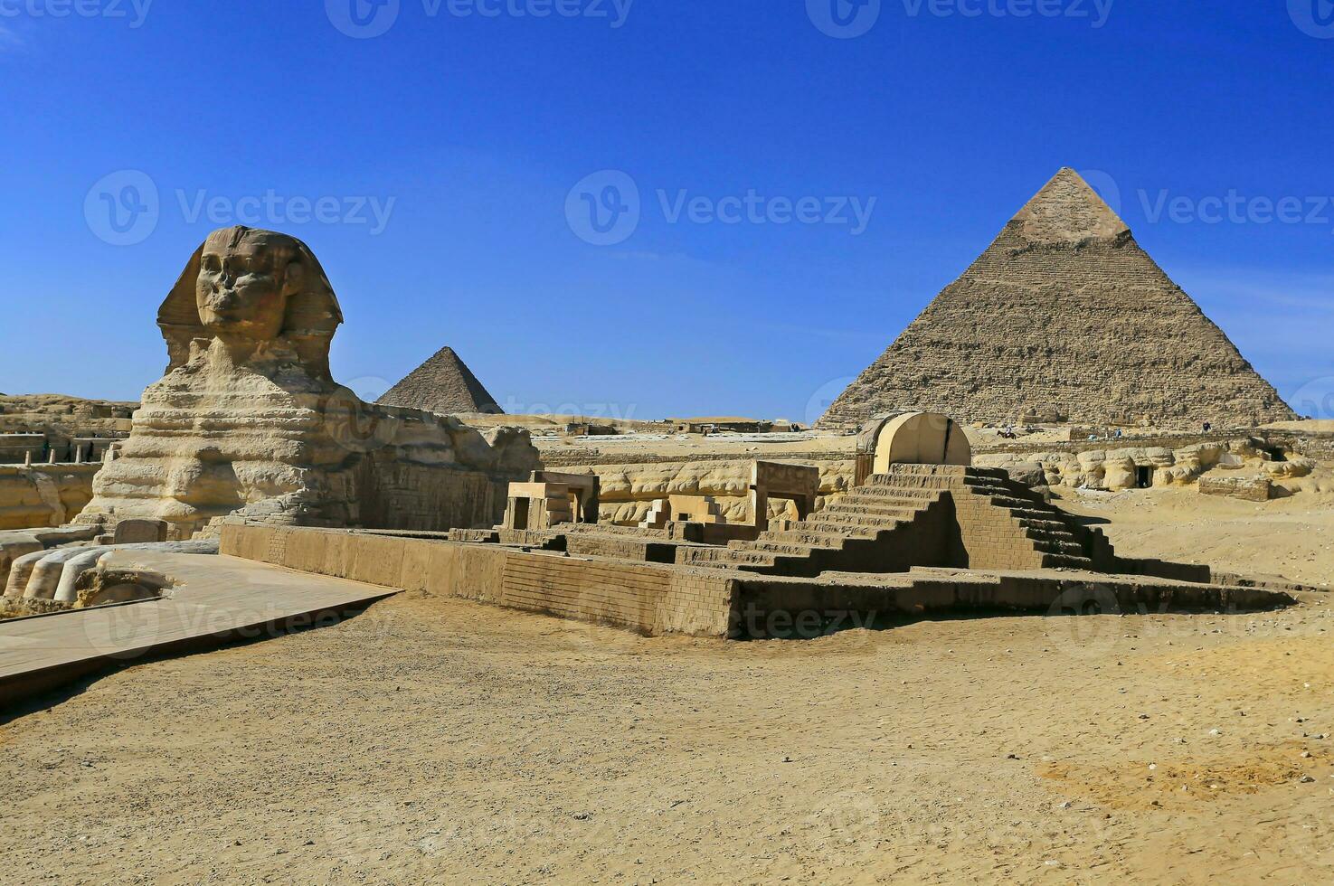 A beautiful picture of the pyramids in Giza in Egypt with the Sphinx photo