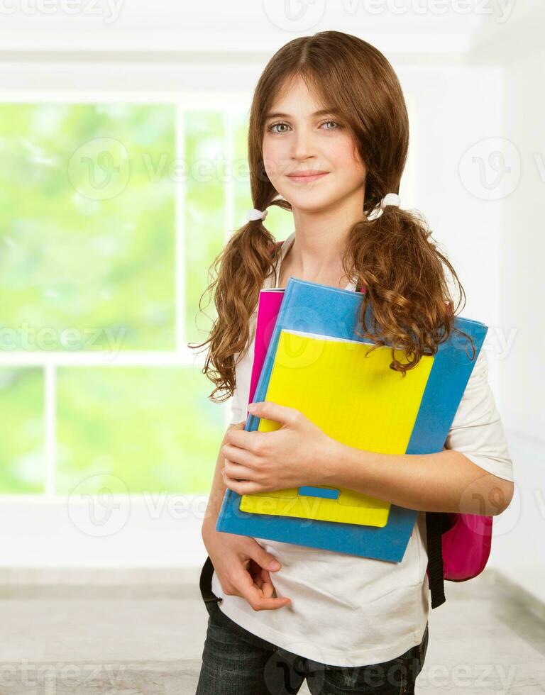 Pretty girl in the classroom photo