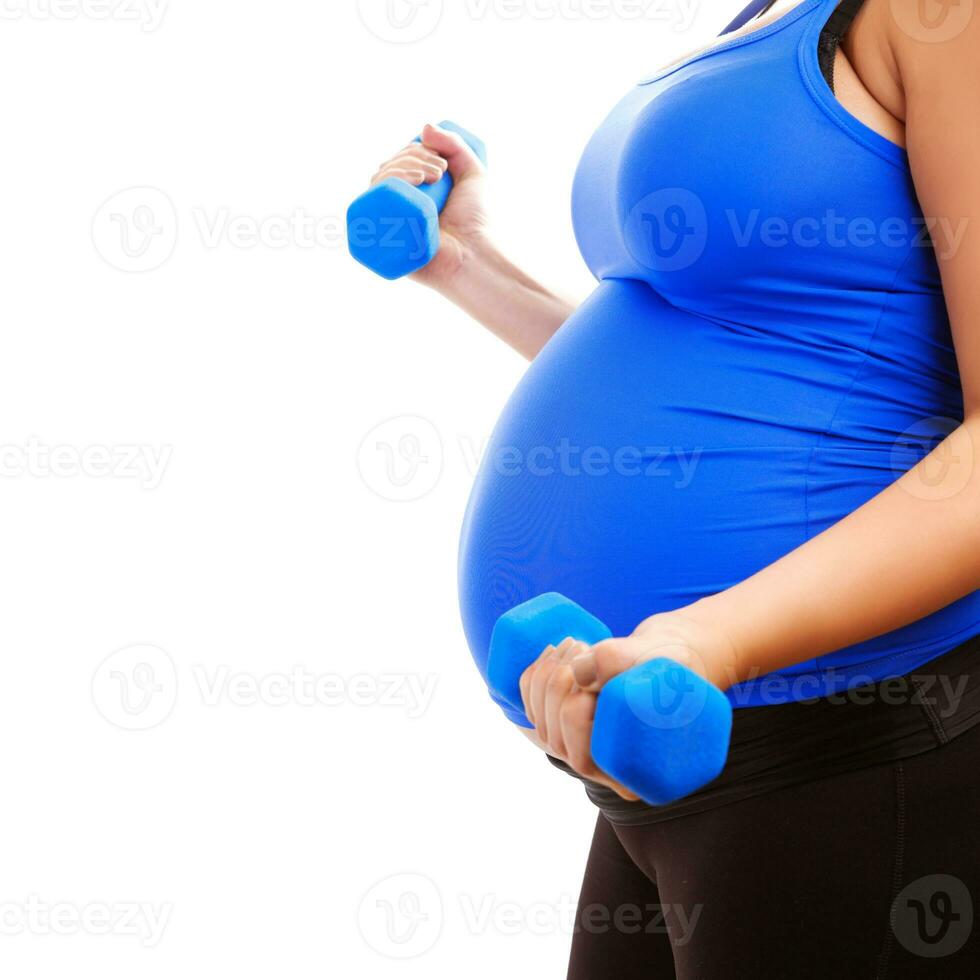 Expectant girl do fitness photo