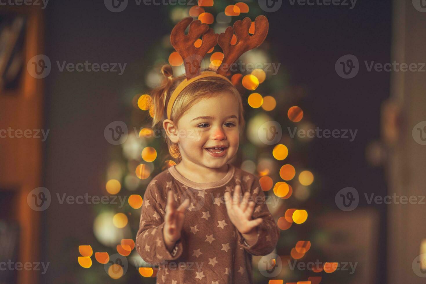Happy child on Christmas party photo
