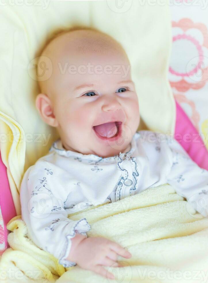 Newborn baby laughing photo