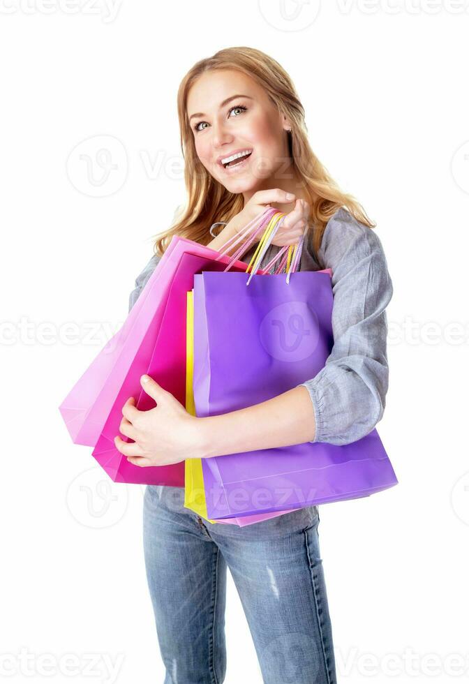 Excited female with shopping bags photo