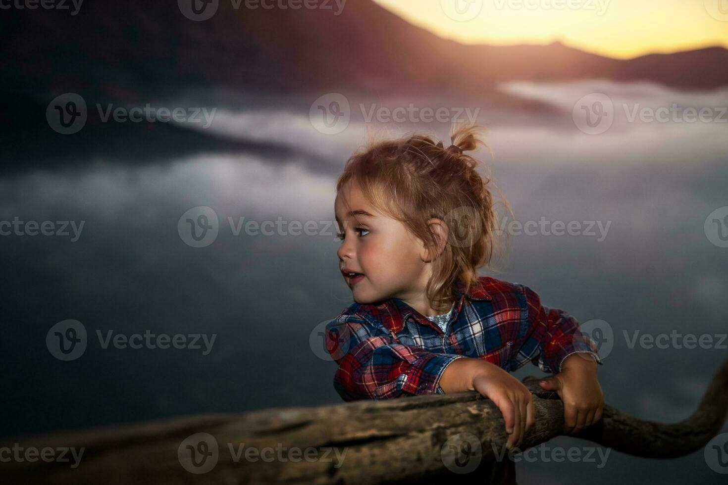 Baby boy having fun outdoors photo