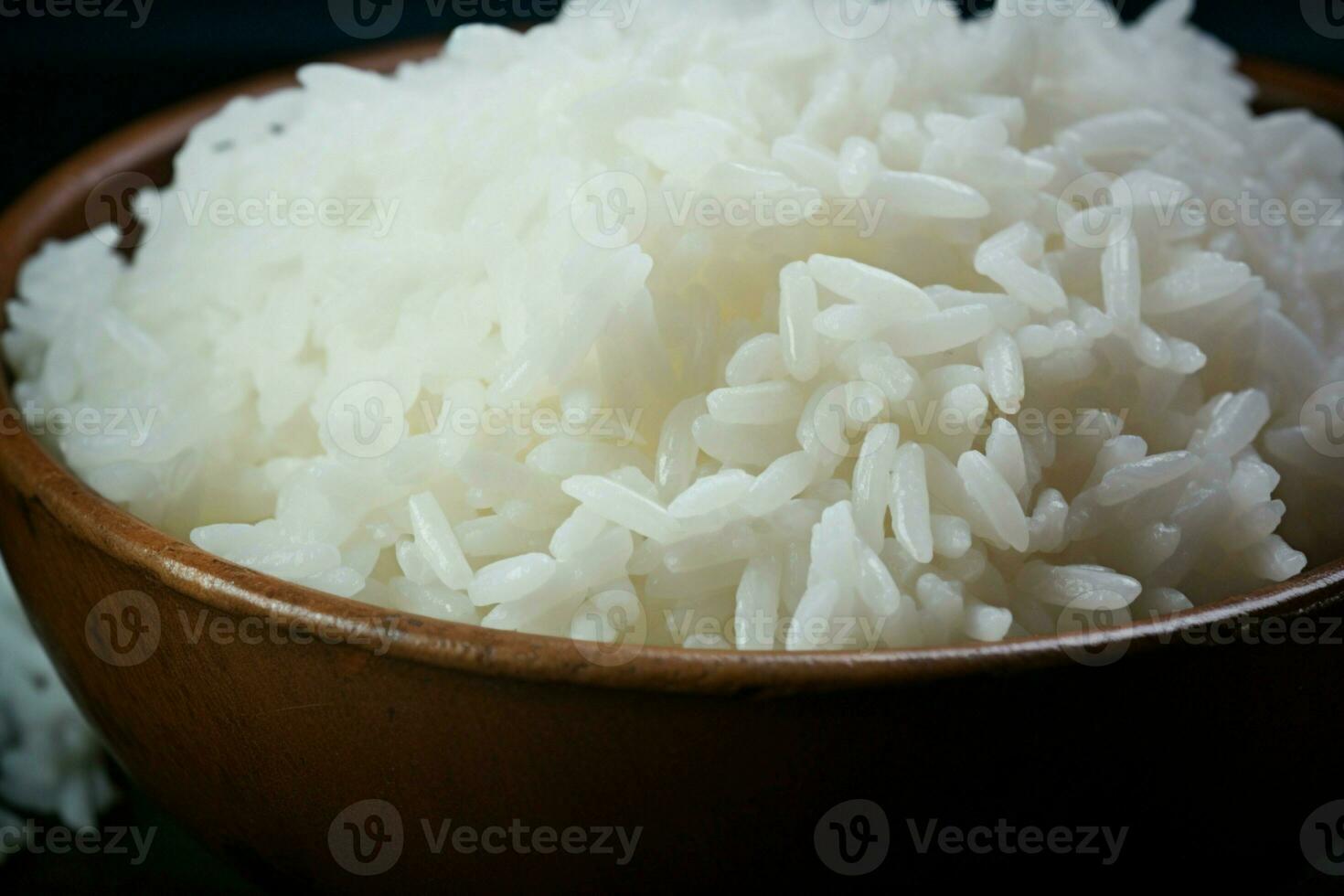 ai generado culinario sencillez cerca arriba de un cuenco lleno con cocido blanco arroz foto