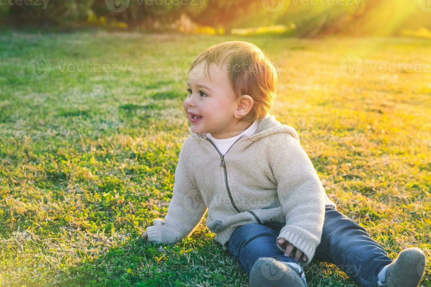 Cute baby boy outdoors photo