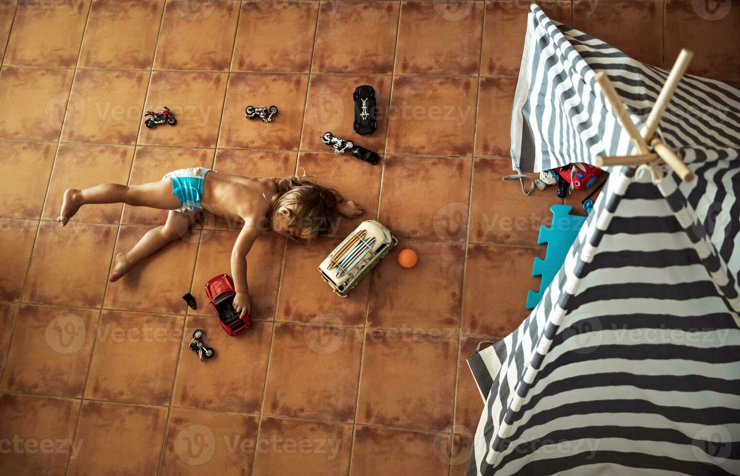 Little boy playing at home photo