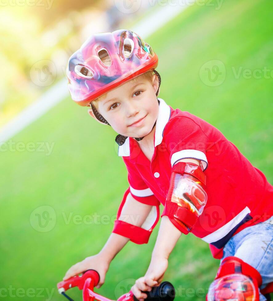 Little boy on bicycle photo