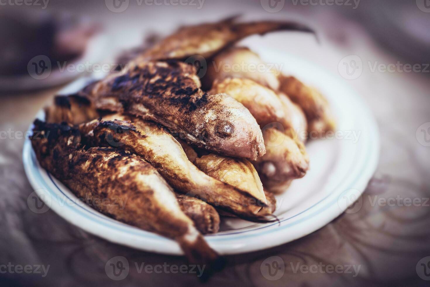 Tasty grilled fishes photo