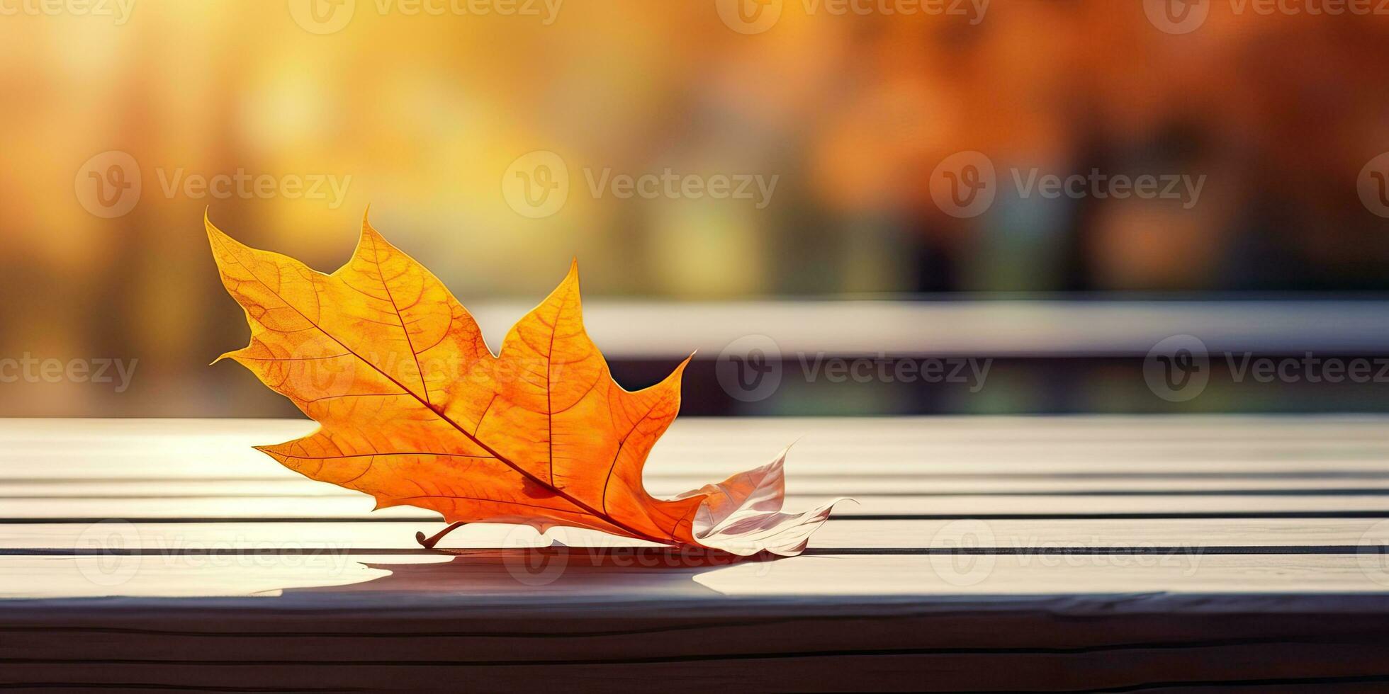 AI generated Beautiful orange leaf on a wooden table in the autumn park. Natural autumn background with blur photo