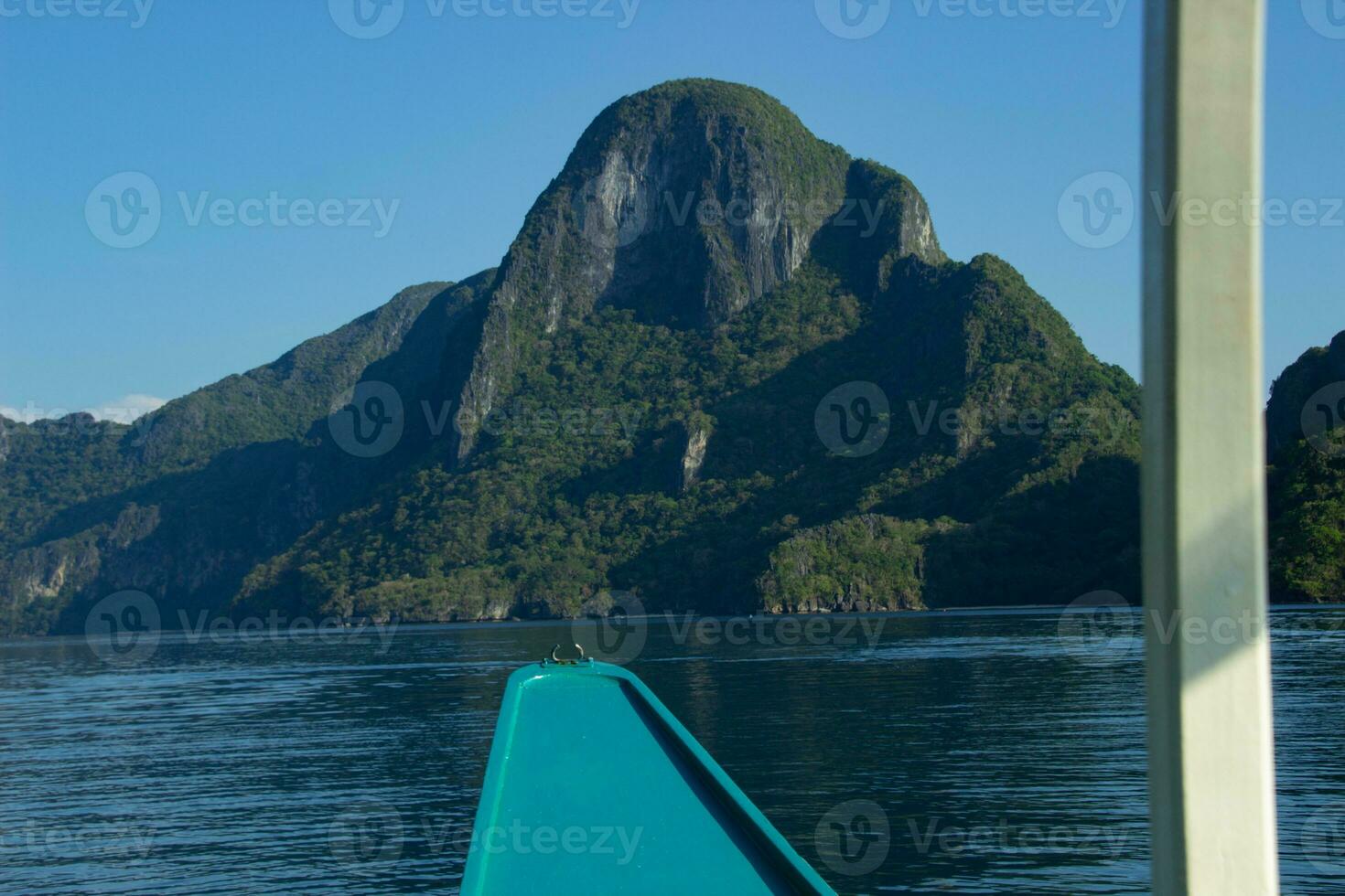 View from a traditional Filipino boat of an island in Palawan. photo