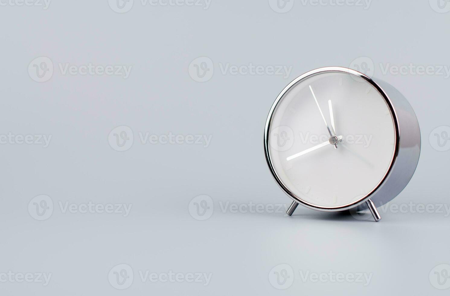 Time and work of every day Photo of a modern alarm clock in a studio