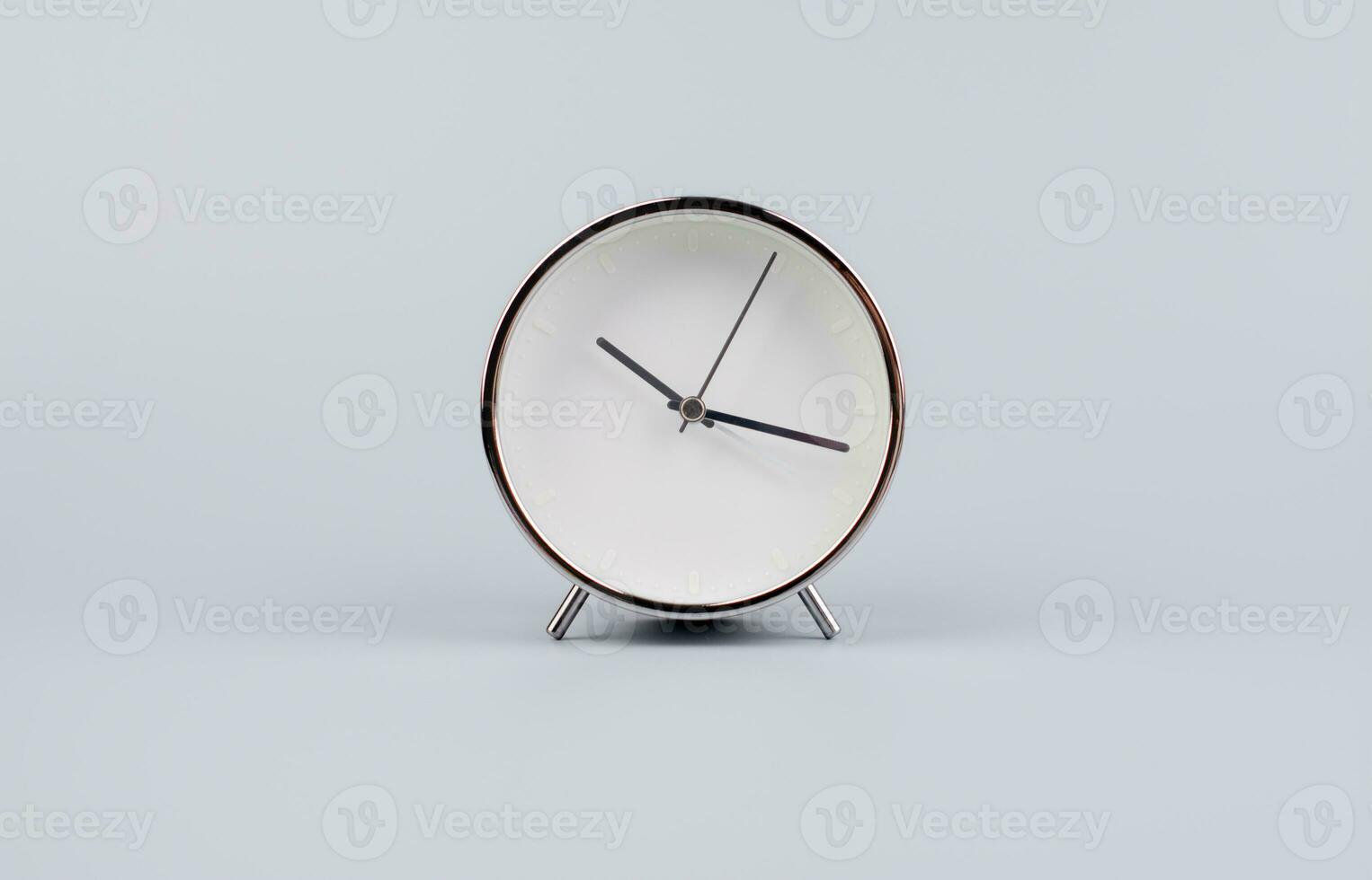 Time and work of every day Photo of a modern alarm clock in a studio