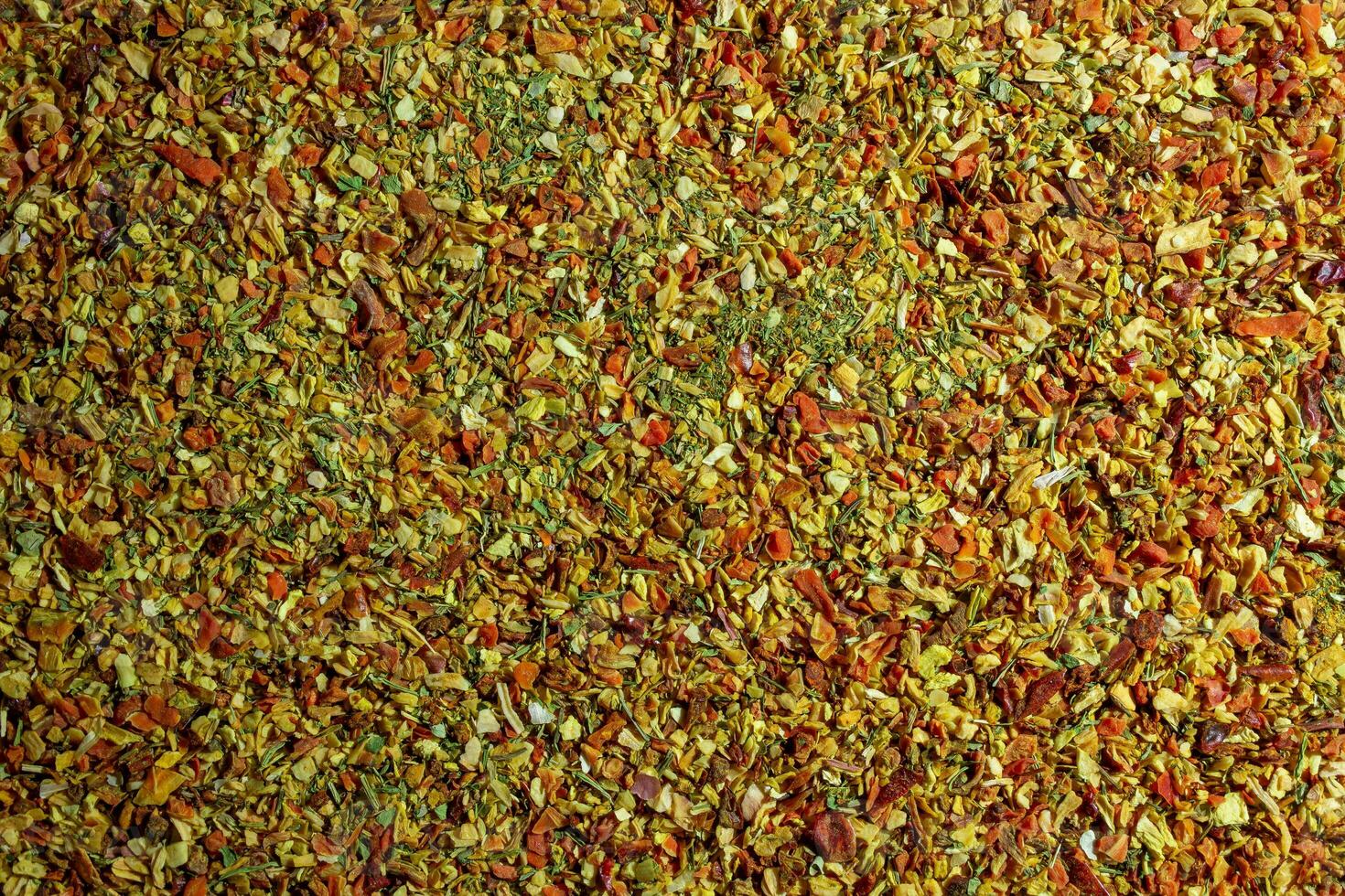 Vibrant and Colored Vegetable Seasoning Mix. A Culinary Canvas of Aromatic Seasoning - Textured Background for Gourmet Cooking. The Harmonious Combination of Fresh Herbs and Spices - Top View photo