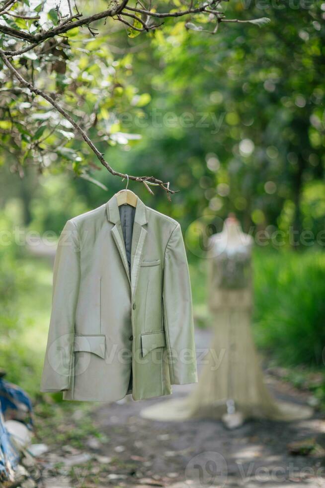 Dress Details. Green wedding dress on mannequin. photo