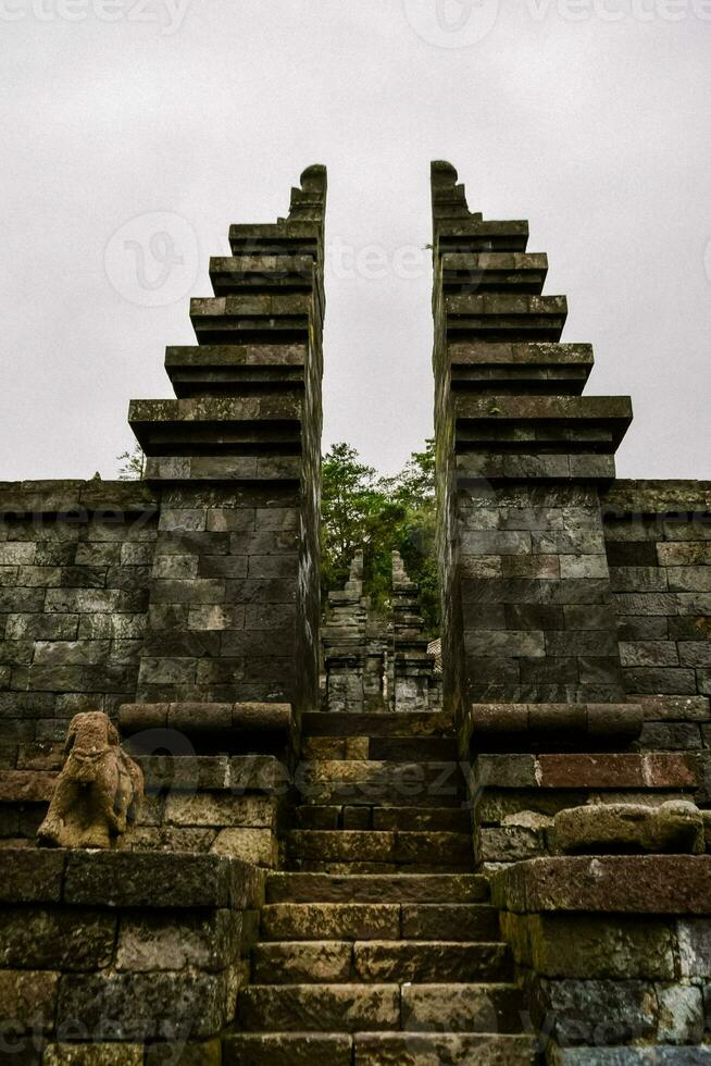Reliefs and temple buildings at the Cetho Temple tourist complex, Karanganyar, East Java photo
