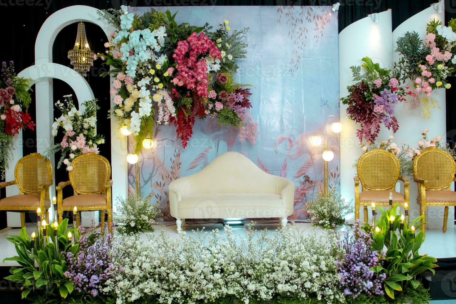 flower arrangements as a backdrop for wedding celebrations in Indonesia. photo