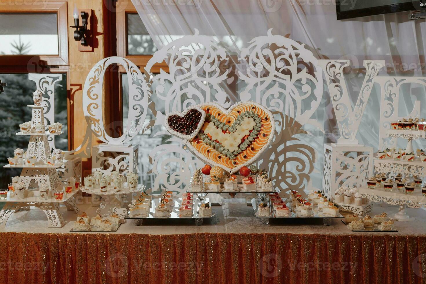 Fruits on wedding reception. Catering sweets, closeup of various kinds of fruit pastry on event or wedding reception photo