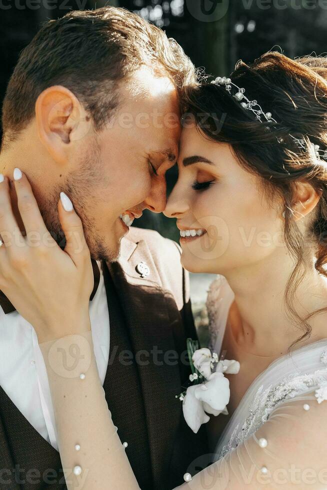 close-up portrait of the bride and groom. beautiful and romantic newlyweds. photo