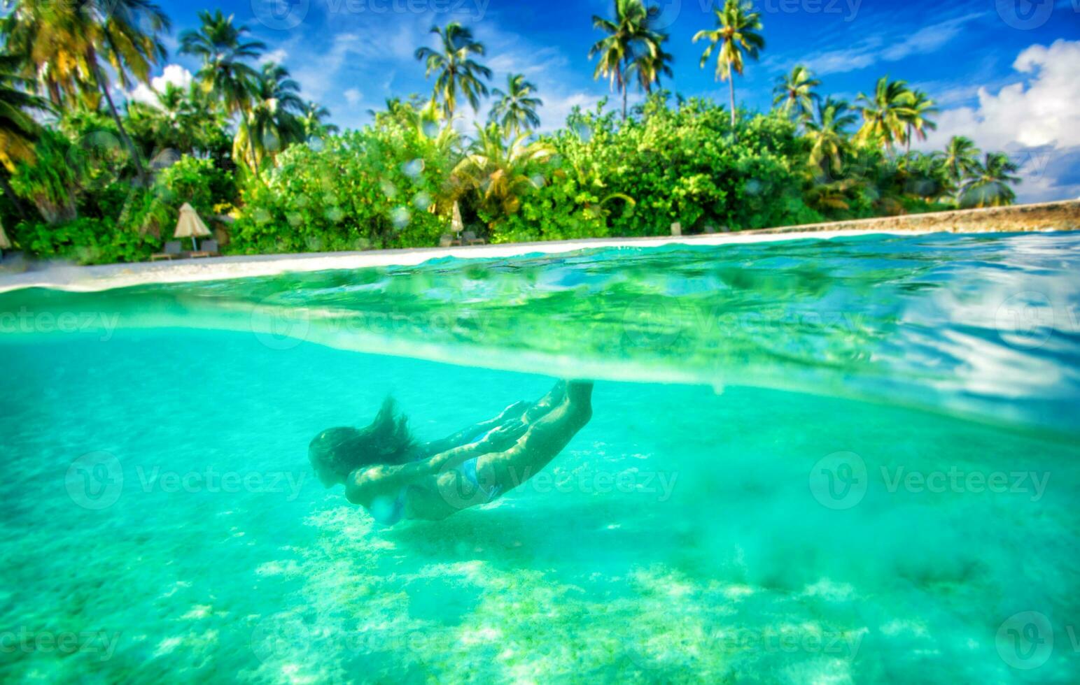 Swimming under water photo