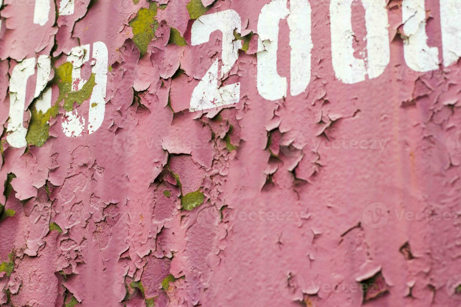 Close up shot of an old paint on the metal surface. Background photo