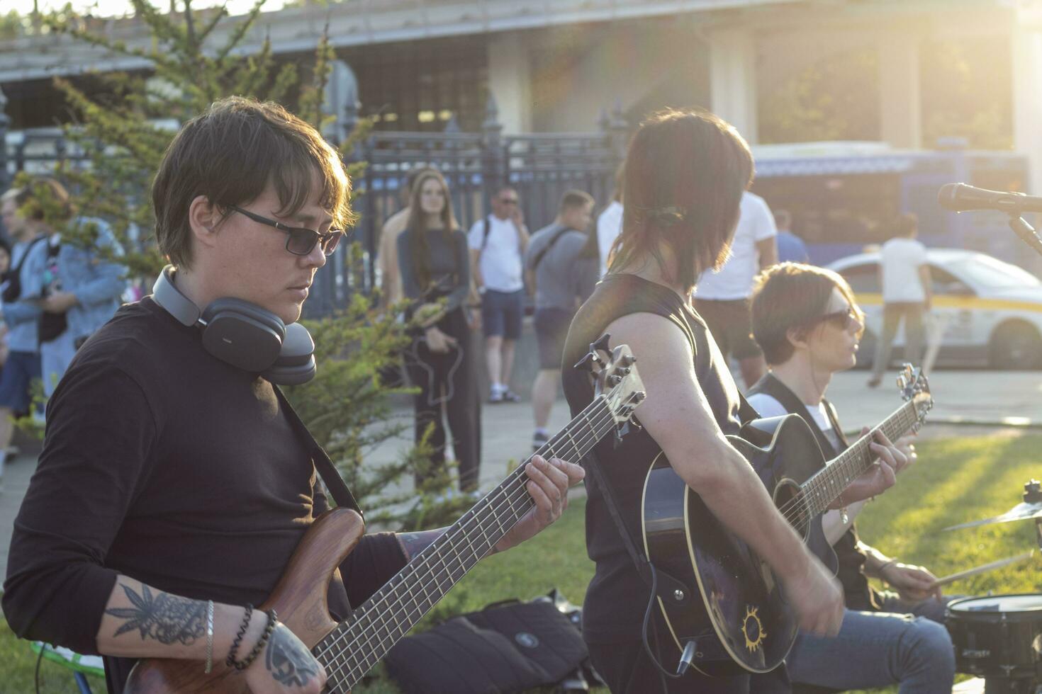 Moscow, Russia - 07.09.2023 - Visitors enjoying street band performance next to VDNKH metro station. Music photo