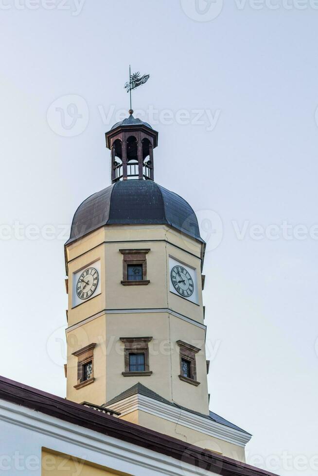 Shot of the clock tower in the European city. Outdoors photo