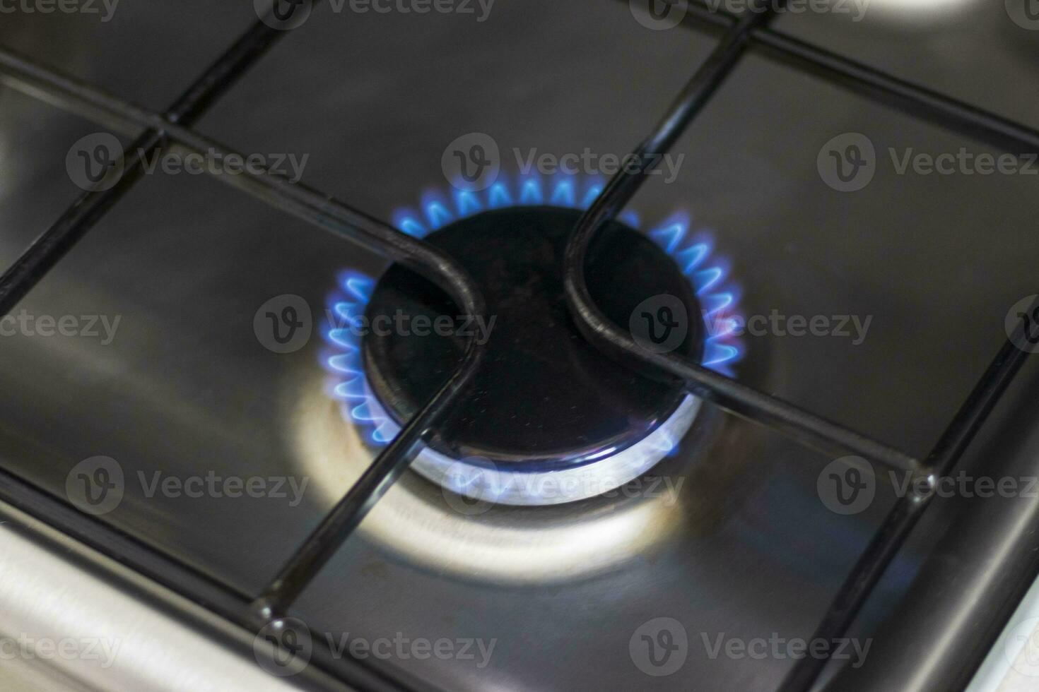 Close up shot of the gas burner from the gas cooker. Household photo