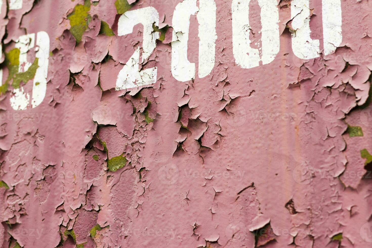 Close up shot of an old paint on the metal surface. Background photo