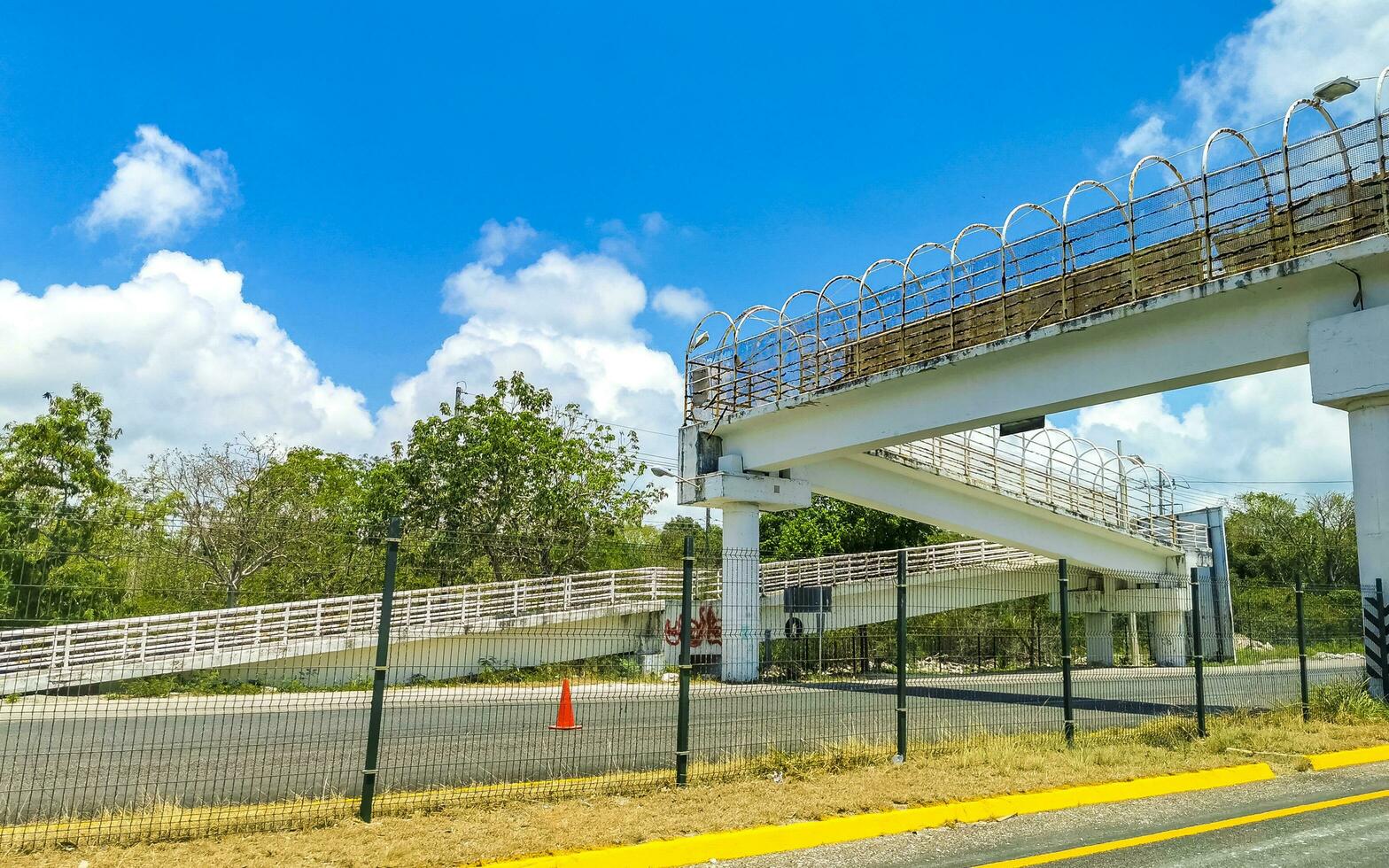 Playa del Carmen Quintana Roo Mexico 2023 Driving car on highway with bridge Playa del Carmen Mexico. photo