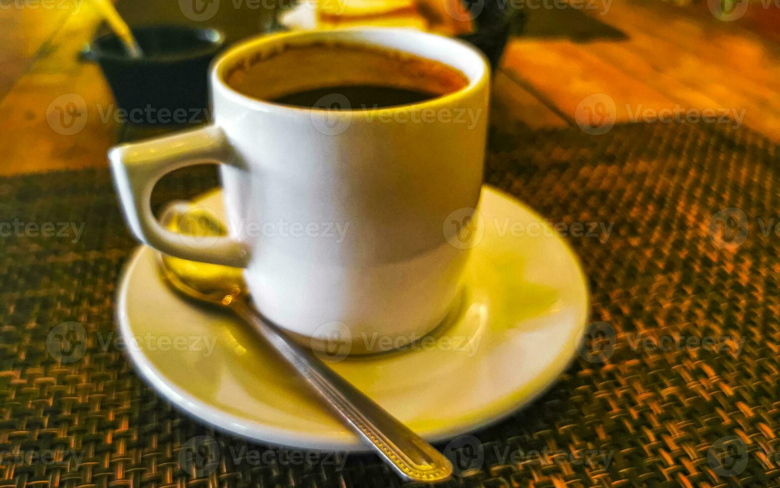 Cup of americano black coffee in restaurant cafe in Mexico. photo