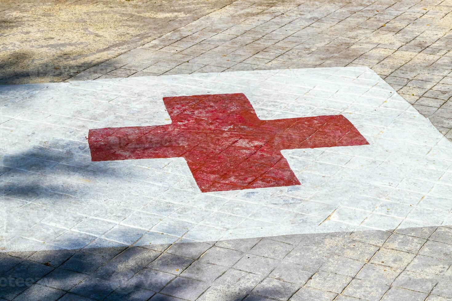 Red Cross sign Sign and symbol at parking lot Mexico. photo